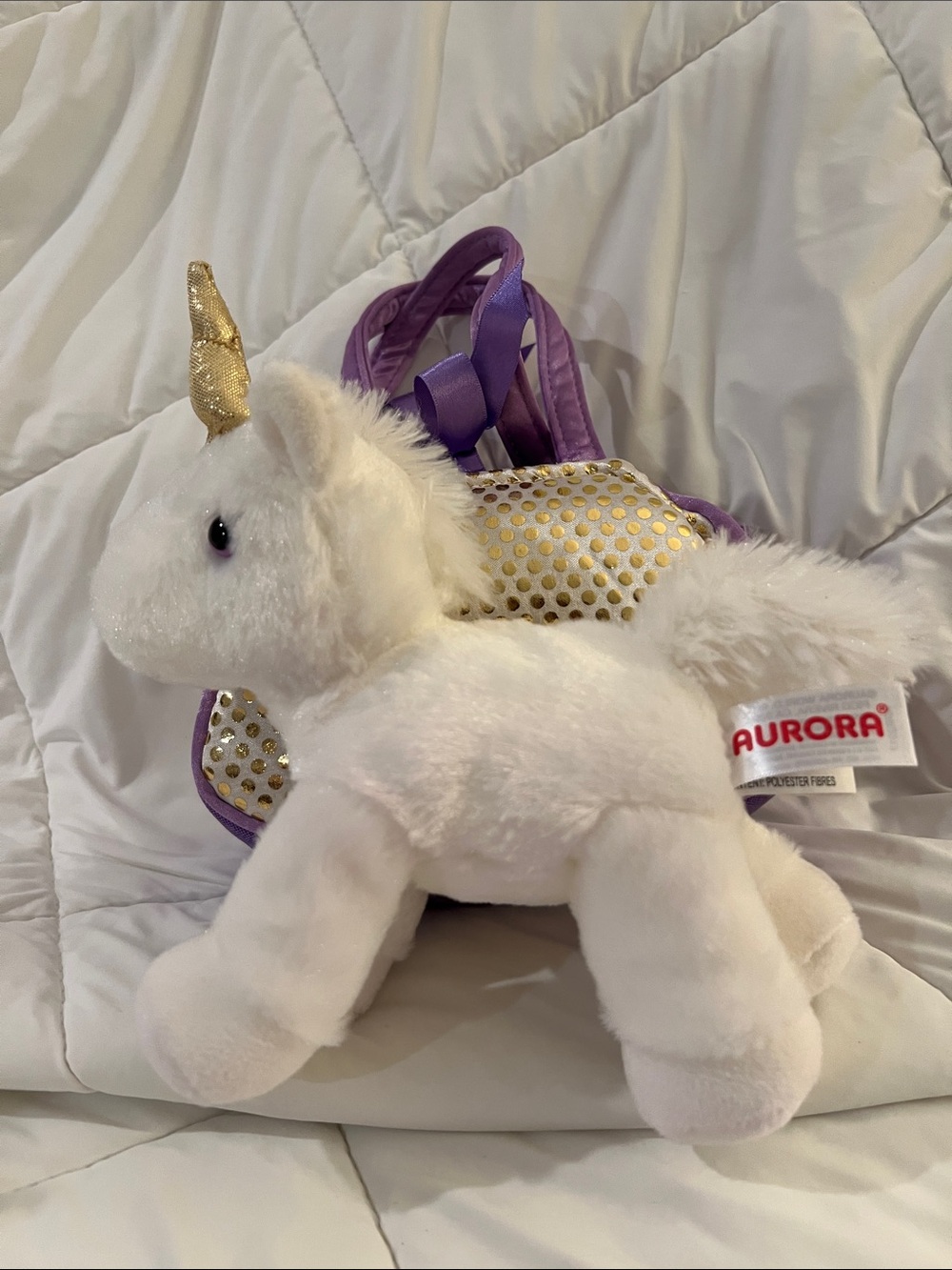 fancy pals by Aurora White Plush Unicorn with purple and gold purse.